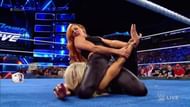 Backy hits her former best friend with the finisher